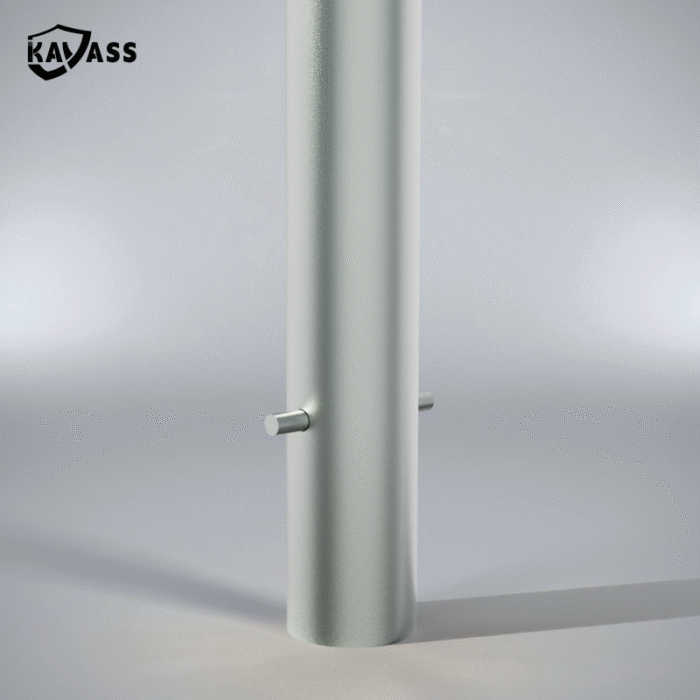 Close-up of side locking pin on hot-dip galvanized in-ground fixed bollard.
