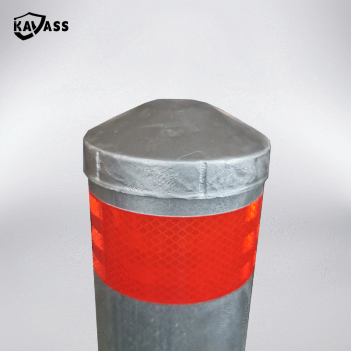 Top detail of galvanized surface mounted bollard with red reflective strip for parking visibility.