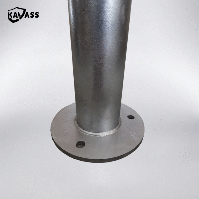 Installation close-up of base flange on hot dip galvanized bollard for secure mounting.
