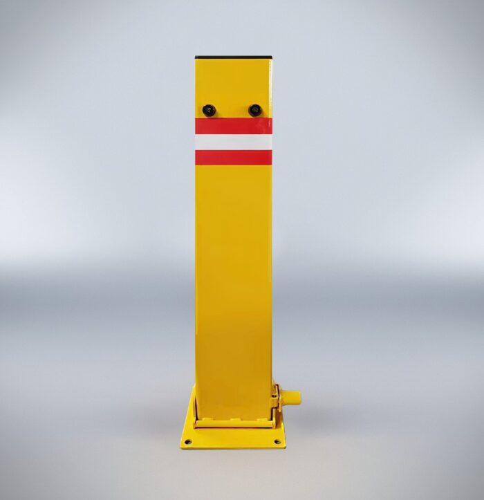 Front view of yellow square folding bollard with integrated keylock, installed in urban street-side parking area.