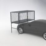 Gray metal mesh over bonnet storage locker with a lock, mounted on a car hood, showing its integrated use with the vehicle.