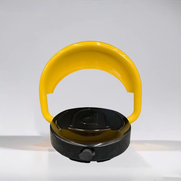 Rear view of yellow D-type remote-controlled parking lock in raised position, powered by dry batteries and equipped with reinforced motor, designed to protect exclusive parking spaces.