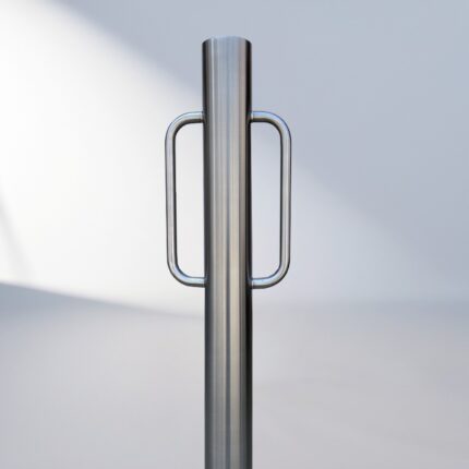Close-up detail of the stainless steel D-type bollard bike rack, focusing on the welded connection between the vertical post and the handle.