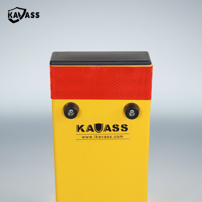 Upper section of folded-down yellow parking bollard, highlighting red reflector and KAVASS branding for visibility.