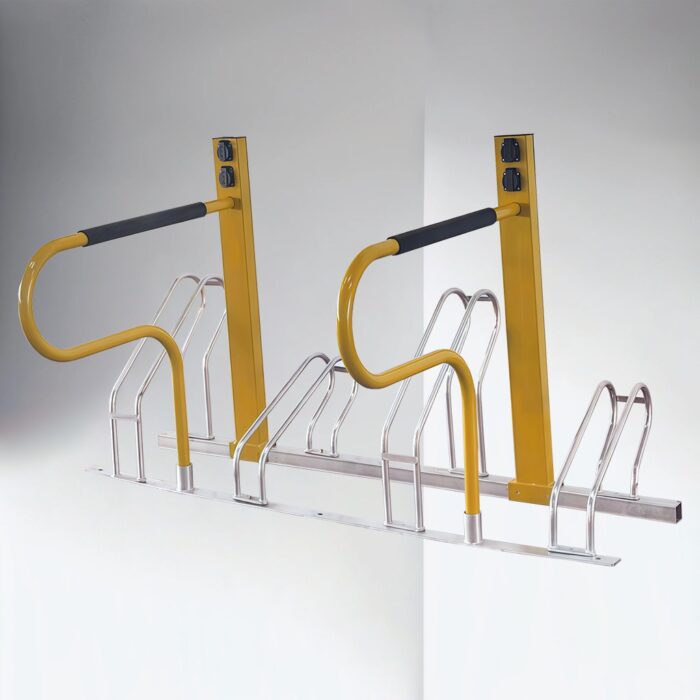 Yellow metal e-bike parking rack with black handles, installed in an outdoor public area for organized bicycle parking.