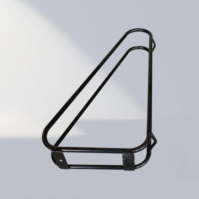 Side view of a black triangular wall-mounted bike rack, highlighting the tilt angle and support structure for stable bike storage.