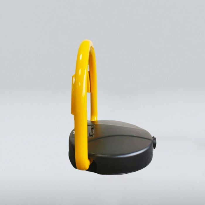 Side view of solar-powered parking lock, featuring yellow curved bar and black base, showcasing side structure and design features.