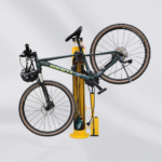 A bicycle mounted on a yellow repair station, showing its use in holding and servicing bikes.