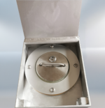 Close-up of manual stainless steel retractable bollard with handle, locking screws, and keyhole, in fully retracted position inside open base.