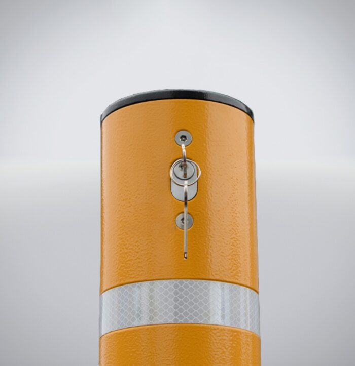 Top detail of the 114 mm Telescopic Bollard - Keylock with bridge handle, featuring reflective strips and integrated lock for enhanced visibility and security.
