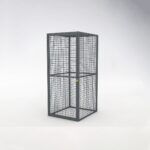 Closed and locked storage mesh locker with gray exterior, designed to securely enclose and protect stored bicycles.