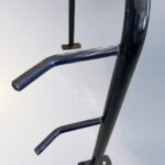 Close-up of C Type Wall Mount Bike Rack showing welding details and metal components, reflecting build quality and durability.