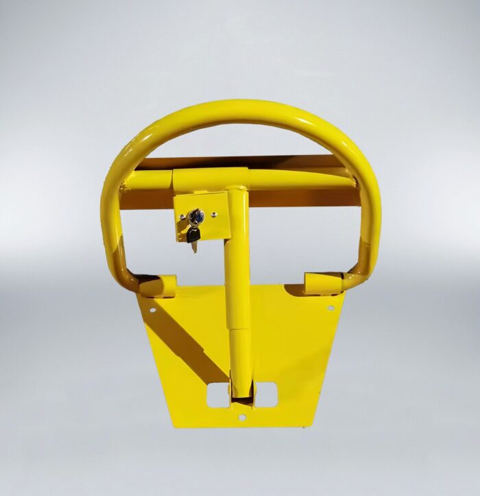 Rear view of yellow collapsible parking post with integrated lock, designed to block unauthorized vehicle access and reserve private parking.
