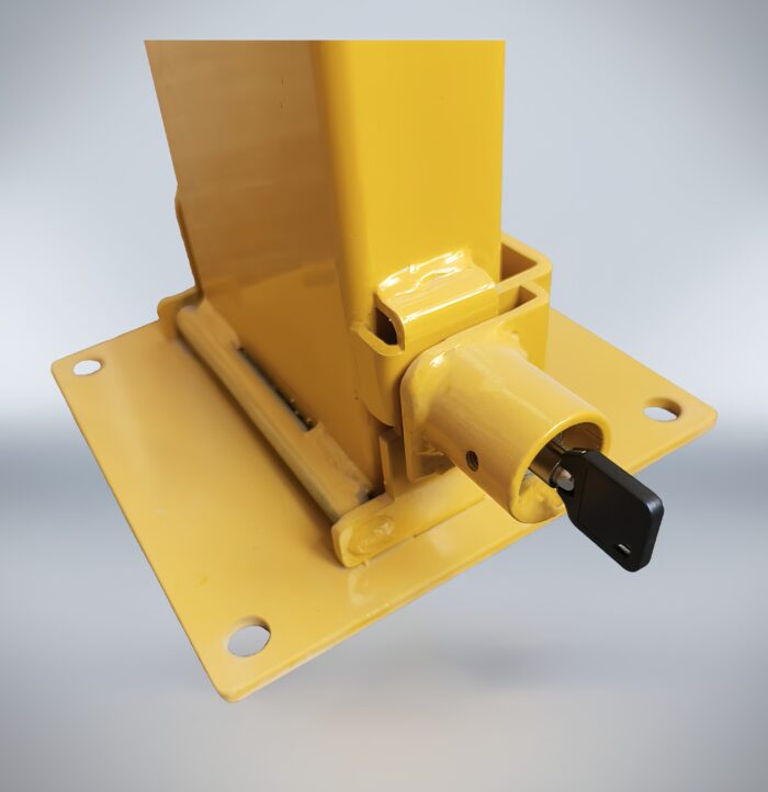 Macro shot of internal key mechanism on folded bollard, showing inserted key in unlocked position.
