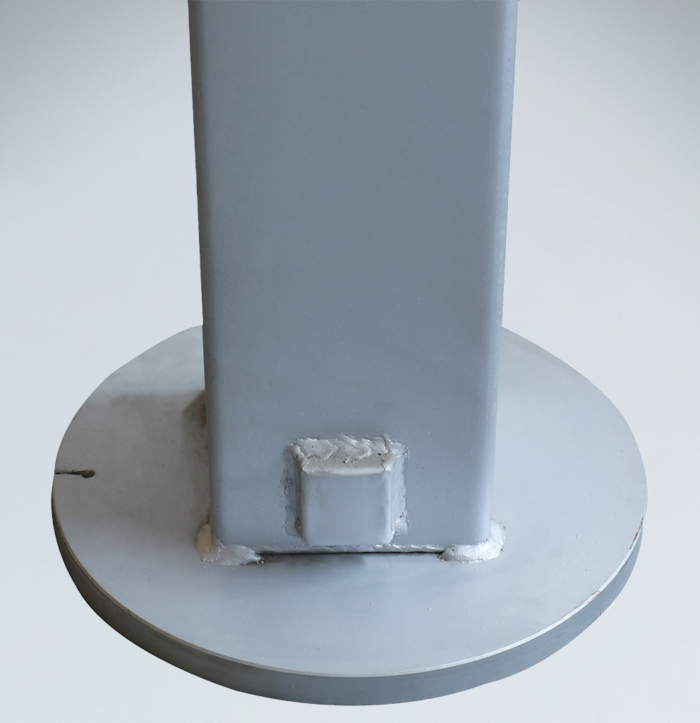 Close-up of 76mm retractable bollard base with hot-dip galvanized finish, offering durability and corrosion resistance for traffic safety.