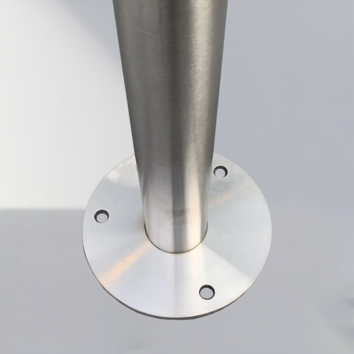 Close-up of the base of a 316 stainless steel surface-mounted hoop bike rack, showing mounting details for stable ground installation.