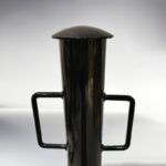 Top close-up of the 89-type underground movable bollard with binaural handle, showing the black body design for easy handling.