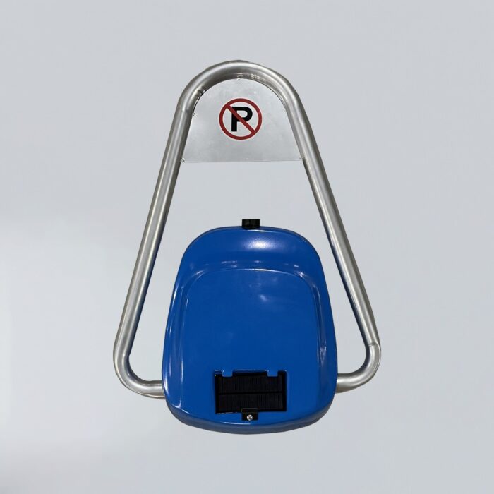 Top-down view of remote-controlled solar parking lock with blue body and lowered silver swing arms, showing layout of surface components and no-parking sign.