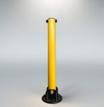 Rear view of powder-coated yellow fold down bollard with reinforced hinge structure for outdoor parking area installation.