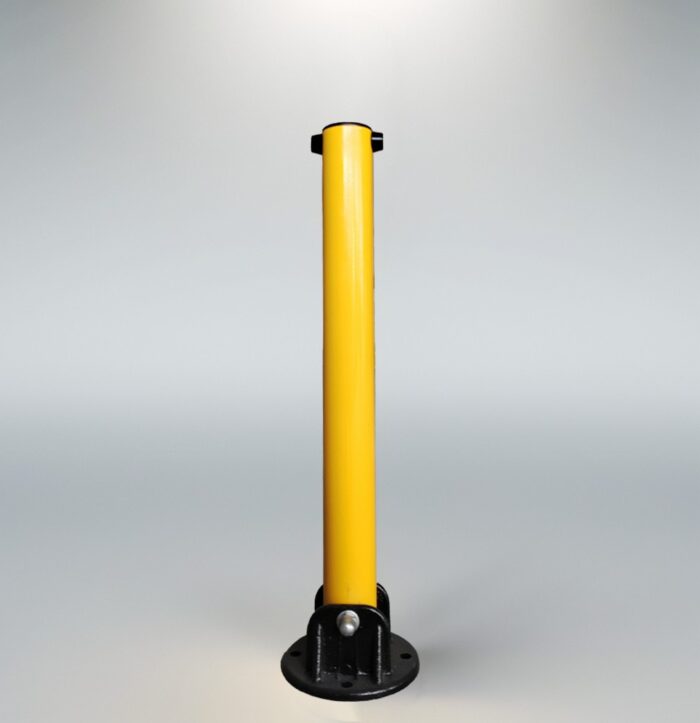 Rear view of powder-coated yellow fold down bollard with reinforced hinge structure for outdoor parking area installation.