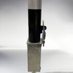 Bottom close-up of the 89-type movable bollard with padlock mechanism, used to lock or unlock and control movement.