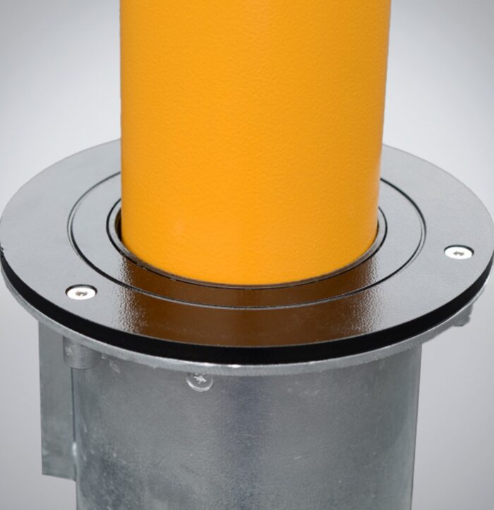 Close-up of the joint between the post and base of the 114 mm Telescopic Bollard - Keylock, demonstrating its solid construction for safe usage.