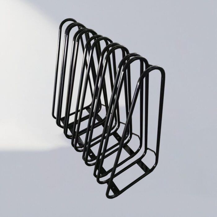 Multiple black triangular wall-mounted bike racks neatly arranged, suitable for indoor and outdoor use, offering space-saving and visually clean bicycle storage.