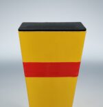 Rear top detail of square bollard, featuring red warning tape and molded plastic cap for rear-side identification.