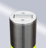 Top detail of the stainless steel 114-type bridge-handle underground lock movable bollard, with smooth finish to showcase design and ensure safety.