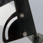 Close-up of Swing Wall Mount Bike Rack showing metal joints and bolt fastenings for structural stability.