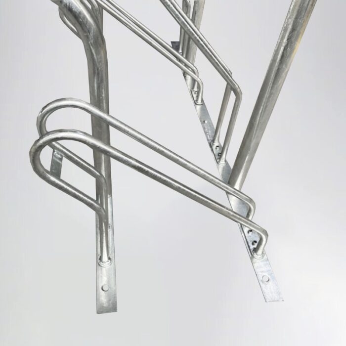 Partial view of Triangle stand bike rack with handles, showing galvanized steel frame and fastening components.