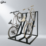 KAVASS black powder-coated semi-vertical bike rack holding two white bicycles, highlighting vertical storage and durable coating surface.