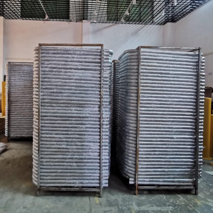 Multiple U-shape Bollards stored on industrial metal frames in the warehouse, showing product stock levels and potential application for bike parking.